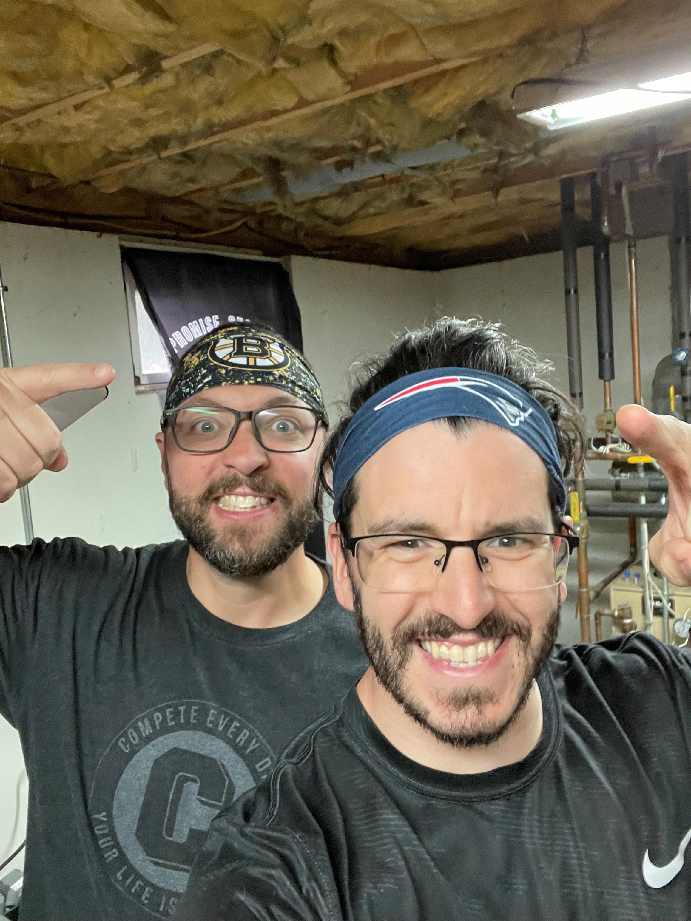 Mike and Craig wearing rival Patriots and Bruins headbands