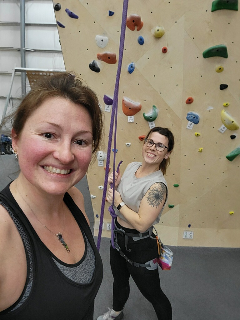 Jami and Miriam together at a climbing gym