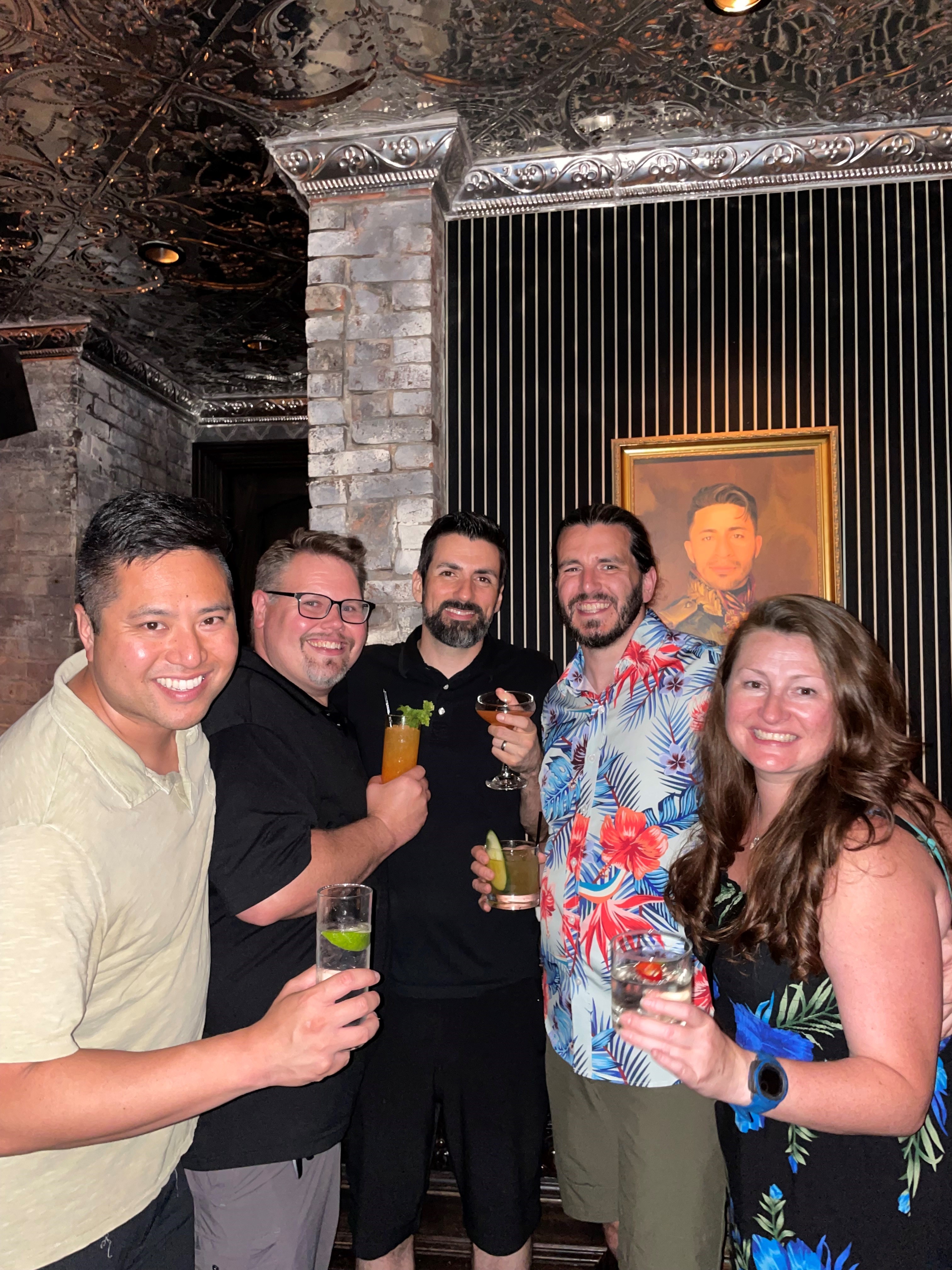 Patrick, Mike, and friends sharing drinks together